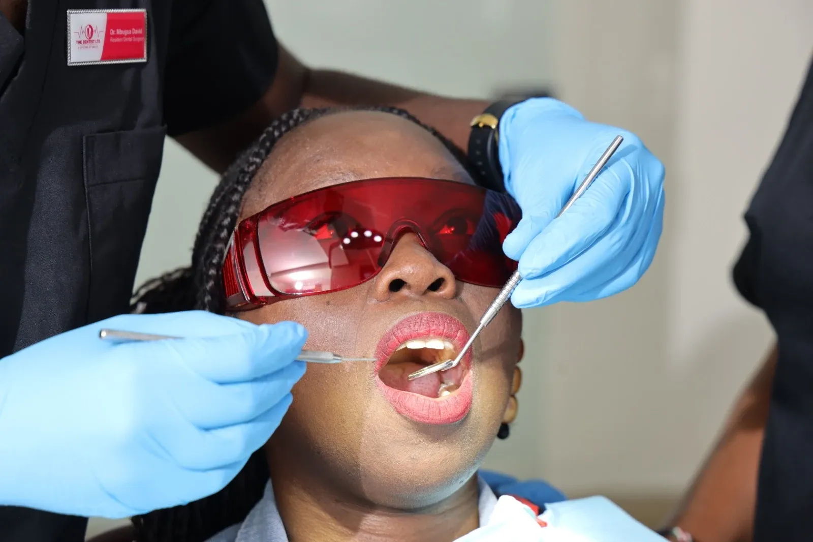 Patient with open mouth being treated